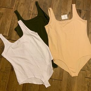 BelleLovin body suites. Set of three. Beige still has tags on it. All XL